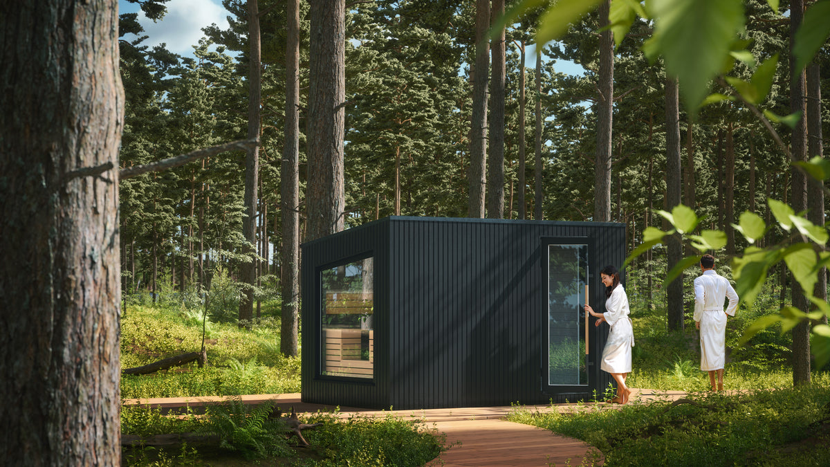 Auroom Terra M outdoor sauna with black exterior and alder benches