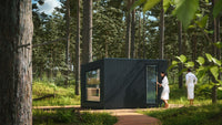 Auroom Terra M outdoor sauna with black exterior and alder benches