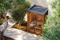 Auroom Mira S outdoor sauna in a landscape setting